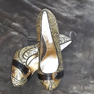 Gold and black heels